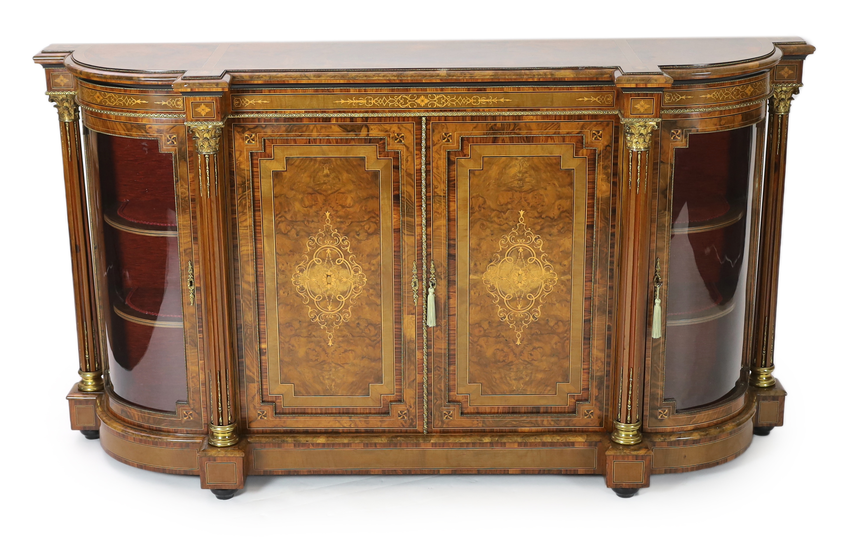 A Victorian marquetry inlaid figured walnut credenza 194cm wide, 49cm deep, 108cm high